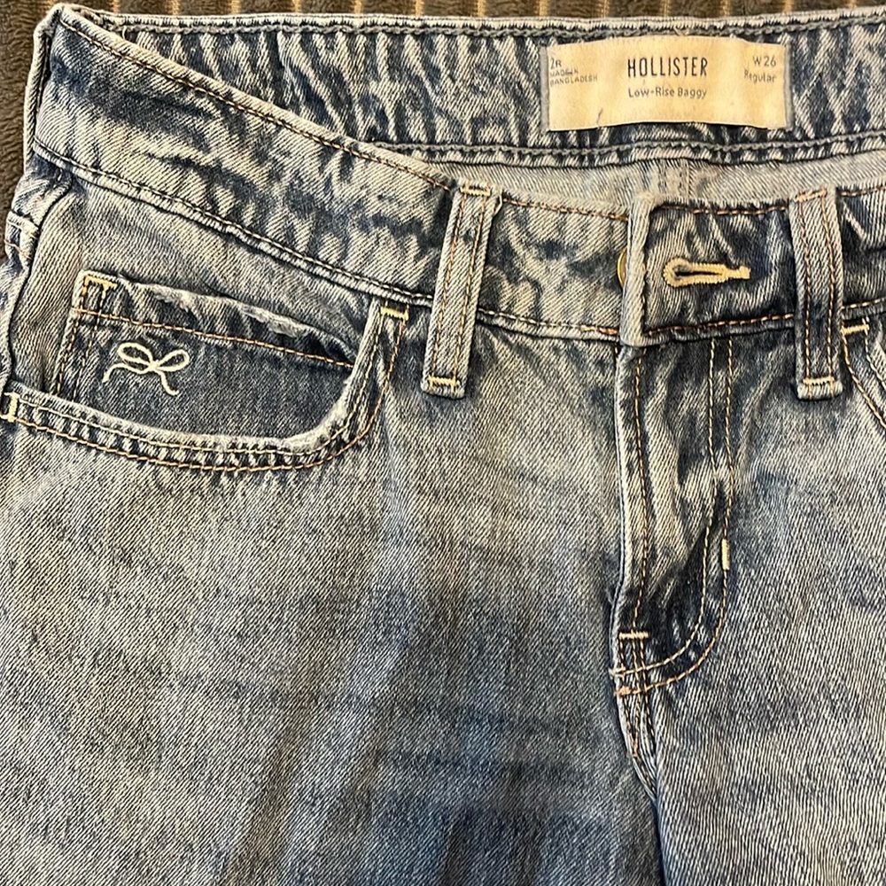 Hollister Faded Blue Denim Jeans w/ Bow Decal